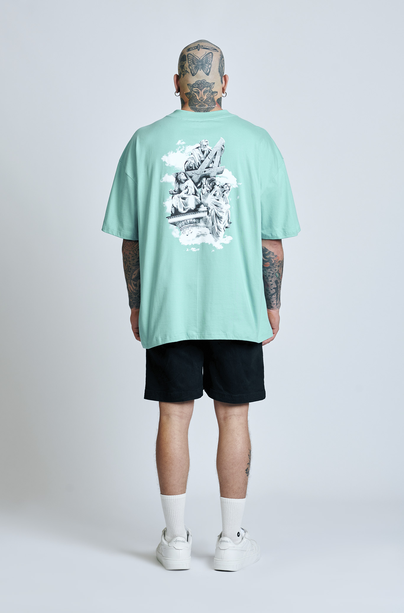 Camiseta Huge Approve Only Saint Turqueza